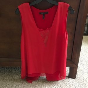 Red sleeveless blouse